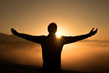 Man refreshed by sun